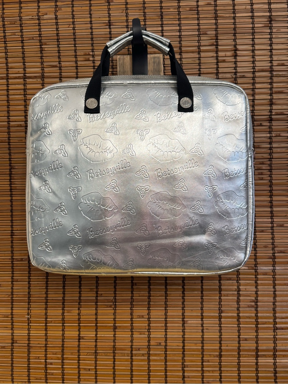 Betseyville Silver Metallic Laptop Bag Embossed Lip and Flaral Pattern - Picture 2 of 7